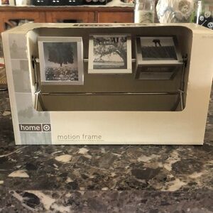 Target home motion frame holder, brand new in the box